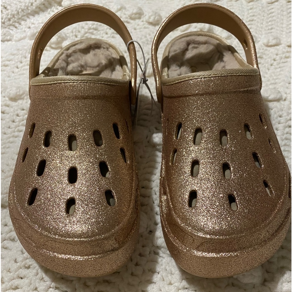 Sketcher woman’s size 7 -rose gold shiny color -NWT - never worn